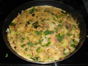 Omelette Savoyarde in the pan